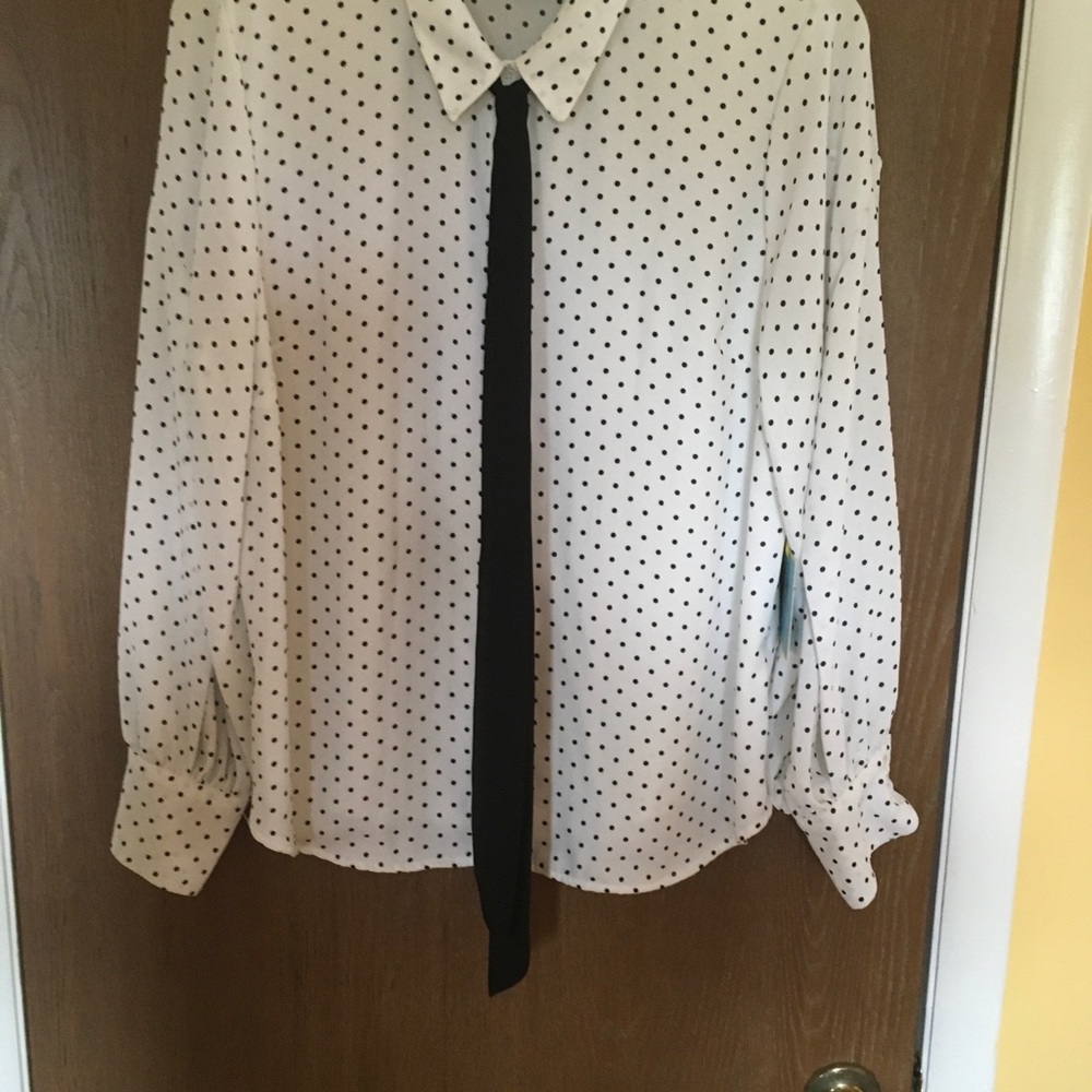 Long sleeve cream colored with black polka dots bow blouse.  Size XL